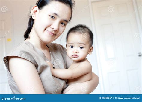 asian mother|315,200+ Asian Mom Stock Photos, Pictures & Royalty